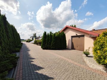 Oszczędny w eksploatacji dom, dwa garaże, duża, zagospodarowana działka - Na sprzedaż  dom  : Główiew